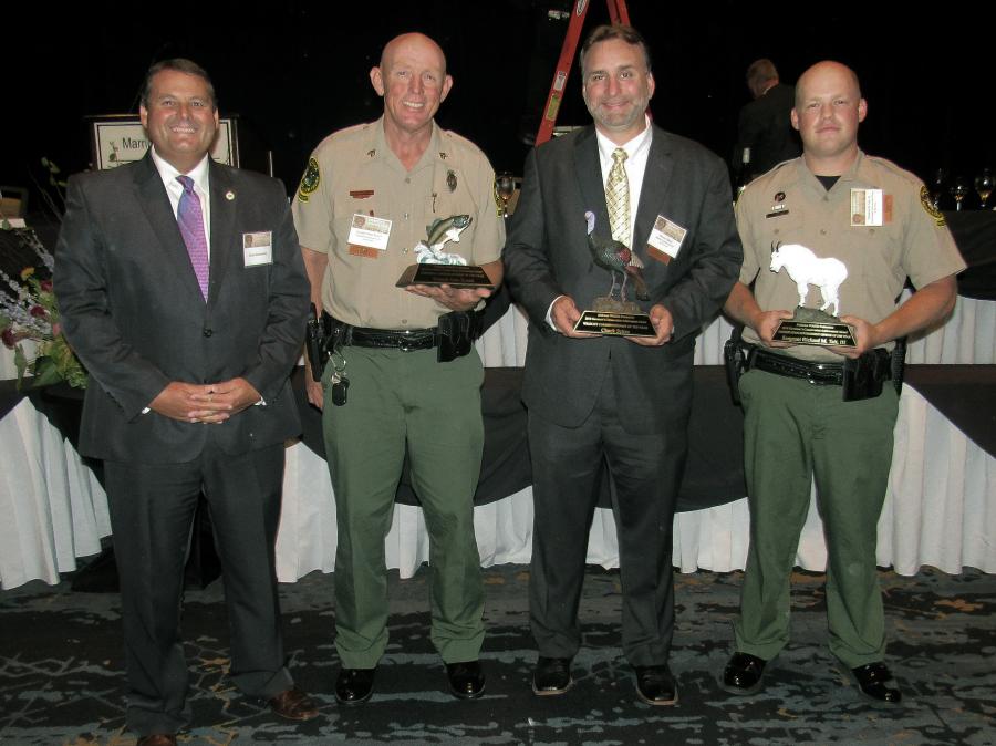 L-R: Conservation Commissioner Chris Blankenship, Wildlife and Freshwater Fisheries Director Chuck Sykes, Sergeant Alan Roach and Officer Richard M. Tait III.
